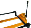 The cart grips the frame underneath a booth’s bench seats.